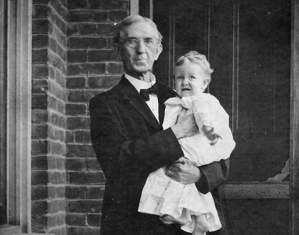 Whitsitt's portrait with his grand daughter 